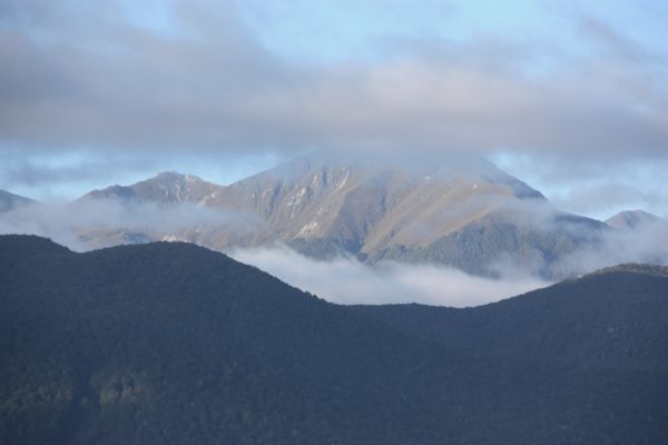 morning clouds on the mountains near Lake Manapouri